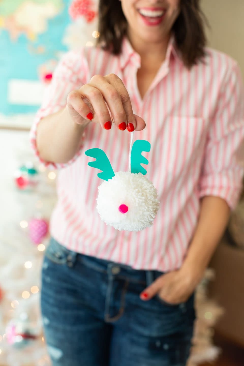 <p>Make a tree full of these soft, whimsical ornaments inspired by reindeer. You can pick any color yarn you want for the face, but we're partial to the blue and pink.</p><p><em><a href="https://lovelyindeed.com/christmas-craft-idea-pom-pom-ornaments-kids/" rel="nofollow noopener" target="_blank" data-ylk="slk:Get the tutorial at Lovely Indeed »;elm:context_link;itc:0;sec:content-canvas" class="link ">Get the tutorial at Lovely Indeed »</a></em></p><p><a class="link " href="https://www.amazon.com/Maker-Sizes-Pompom-Knitting-Project/dp/B07KYJGS2M?tag=syn-yahoo-20&ascsubtag=%5Bartid%7C10055.g.34112389%5Bsrc%7Cyahoo-us" rel="nofollow noopener" target="_blank" data-ylk="slk:Shop Now;elm:context_link;itc:0;sec:content-canvas">Shop Now</a></p>