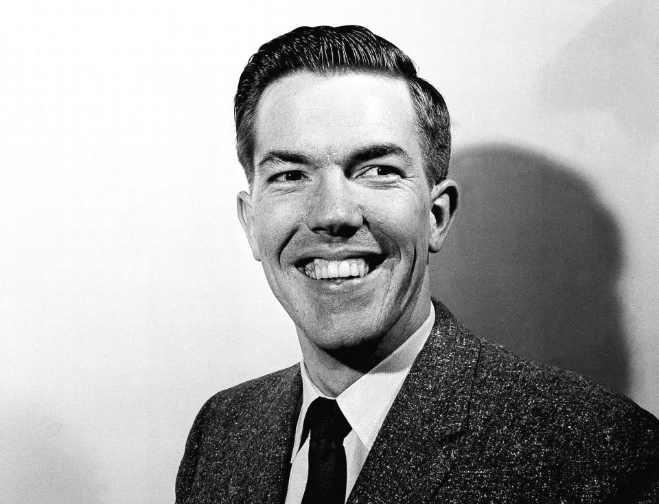 FILE - Associated Press photo desk staffer Hal Buell smiles in New York on March 27, 1958. Buell, who led The Associated Press' photo operations from the darkroom era into the age of digital photography over a four-decade career with the news organization that included 12 Pulitzer Prizes and running some of the defining images of the Vietnam War, has died. Buell died Monday, Jan. 29, 2024, in Sunnyvale, Calif., where his daughter lived, after battling pneumonia. He was 92. (AP Photo/Matty Zimmermann, File)