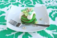 <p>Drizzled with a rich and sweet cream cheese topping (complete with green Lucky Charms), this hearty breakfast is the perfect way to kickstart a day of festivities.</p><p><strong><a href="https://www.countryliving.com/food-drinks/recipes/a30186/green-velvet-silver-dollar-pancakes-recipe-ghk0314/" rel="nofollow noopener" target="_blank" data-ylk="slk:Get the recipe;elm:context_link;itc:0;sec:content-canvas" class="link ">Get the recipe</a>.</strong> </p>