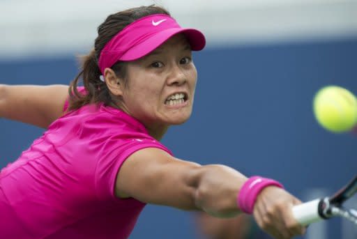 Na Li of China makes a return to Britain's Heather Watson during their US Open women's first round match on Monday. Li beat Watson 6-2, 6-3