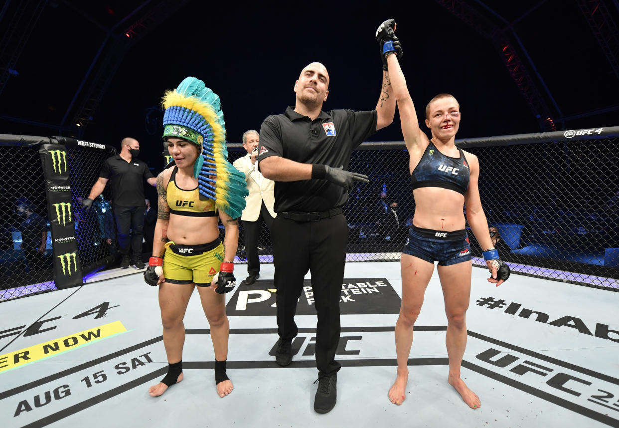 ABU DHABI, UNITED ARAB EMIRATES - JULY 12: In this handout image provided by UFC, Rose Namajunas celebrates after her split-decision victory over Jessica Andrade of Brazil in their strawweight fight during the UFC 251 event at Flash Forum on UFC Fight Island on July 12, 2020 on Yas Island, Abu Dhabi, United Arab Emirates. (Photo by Jeff Bottari/Zuffa LLC via Getty Images)