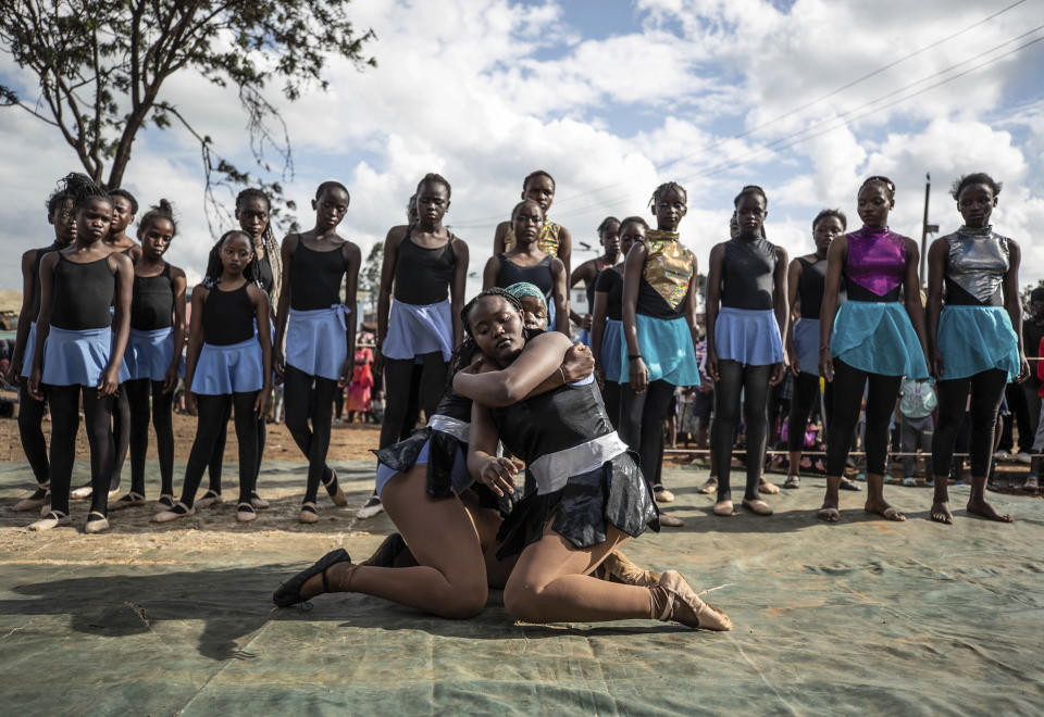 Young dancers perform during a Christmas ballet event in Kibera, one of the busiest neighborhoods of Kenya's capital, Nairobi, Friday, Dec. 15, 2023. The ballet project is run by Project Elimu, a community-driven nonprofit that offers after-school arts education and a safe space to children in Kibera. (AP Photo/Brian Inganga)