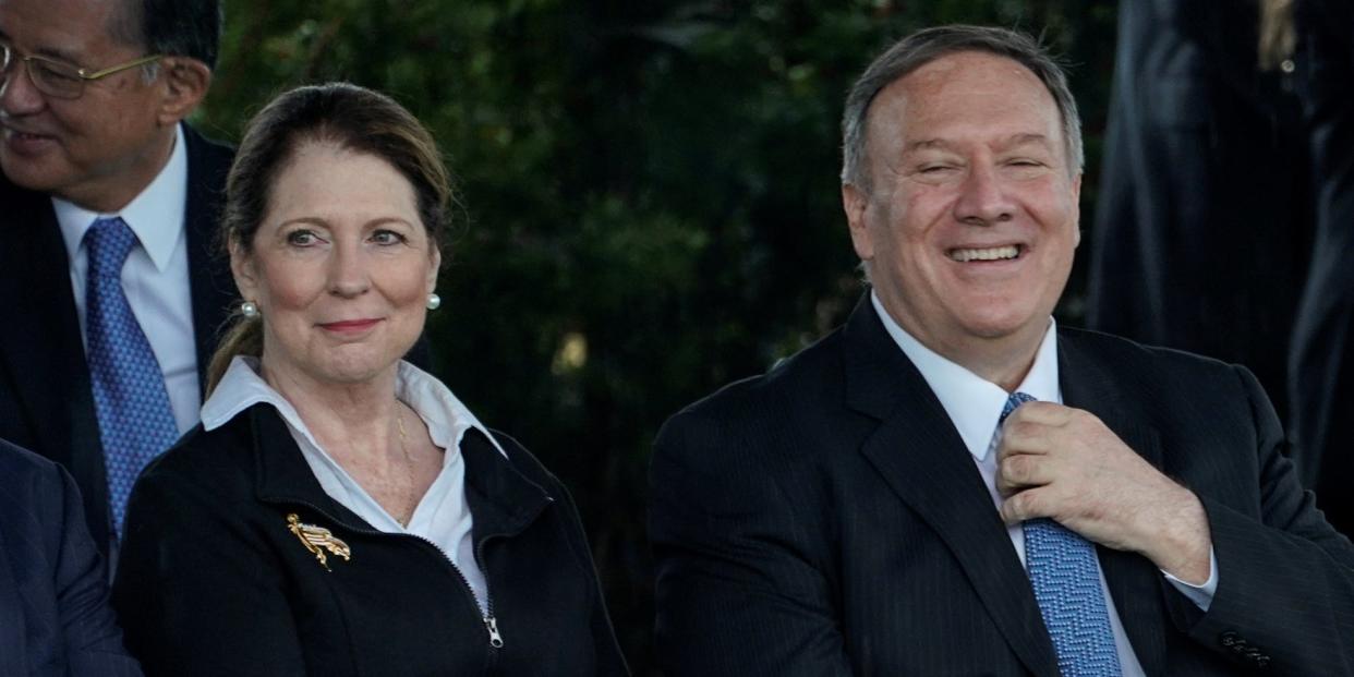 Secretary of State Mike Pompeo sits with his wife Susan prior to a welcome ceremony in honor of new Joint Chiefs of Staff Chairman Army General Mark Milley at Joint Base Myer Henderson Hall, Virginia, on September 30, 2019..JPG