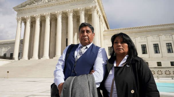 PHOTO: Beatriz Gonzalez and Jose Hernandez, mother and stepfather of Nohemi Gonzalez who was fatally shot in the 2015 Paris attacks, stand outside the U.S. Supreme Court after justices heard arguments in Gonzalez v. Google in Washington, Feb. 21, 2023. (Kevin Lamarque/Reuters, FILE)