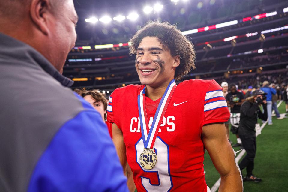 Westlake wide receiver Jaden Greathouse (9) celebrates winning the Class 6A Division 2 State Championship against Guyer at AT&T Stadium in Arlington, Texas on Dec. 18, 2021. Westlake defeated Guyer 40-21.