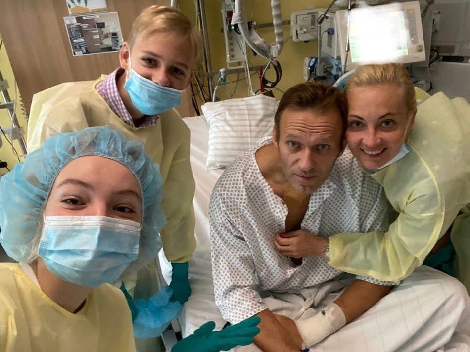 <p>Alexei Navalny with his family in a  Berlin hospital last September while being treated for novichok poisoning</p> (Alexei Navalny/Instagram/AFP)