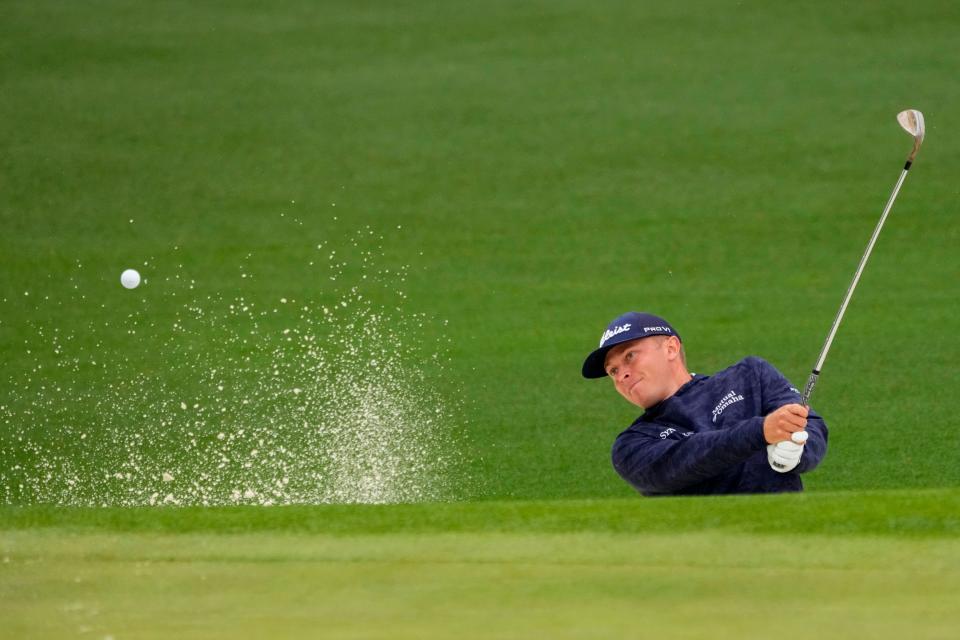 Apr 3, 2023; Augusta, Georgia, USA; Ben Carr hits from a bunker on no. 2 during a practice round for The Masters golf tournament at Augusta National Golf Club. Mandatory Credit: Rob Schumacher-USA TODAY Network