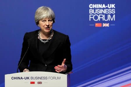 British Prime Minister Theresa May speaks at the China-UK business forum in Shanghai, China February 2, 2018. REUTERS/Stringer