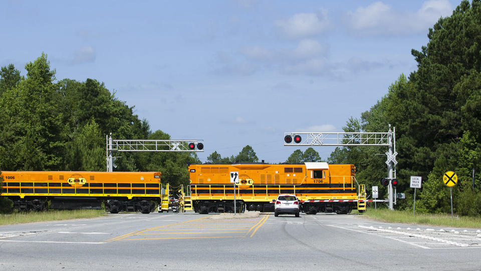 A Georgia Central train at a rail crossing. (Photo: Genesee & Wyoming)