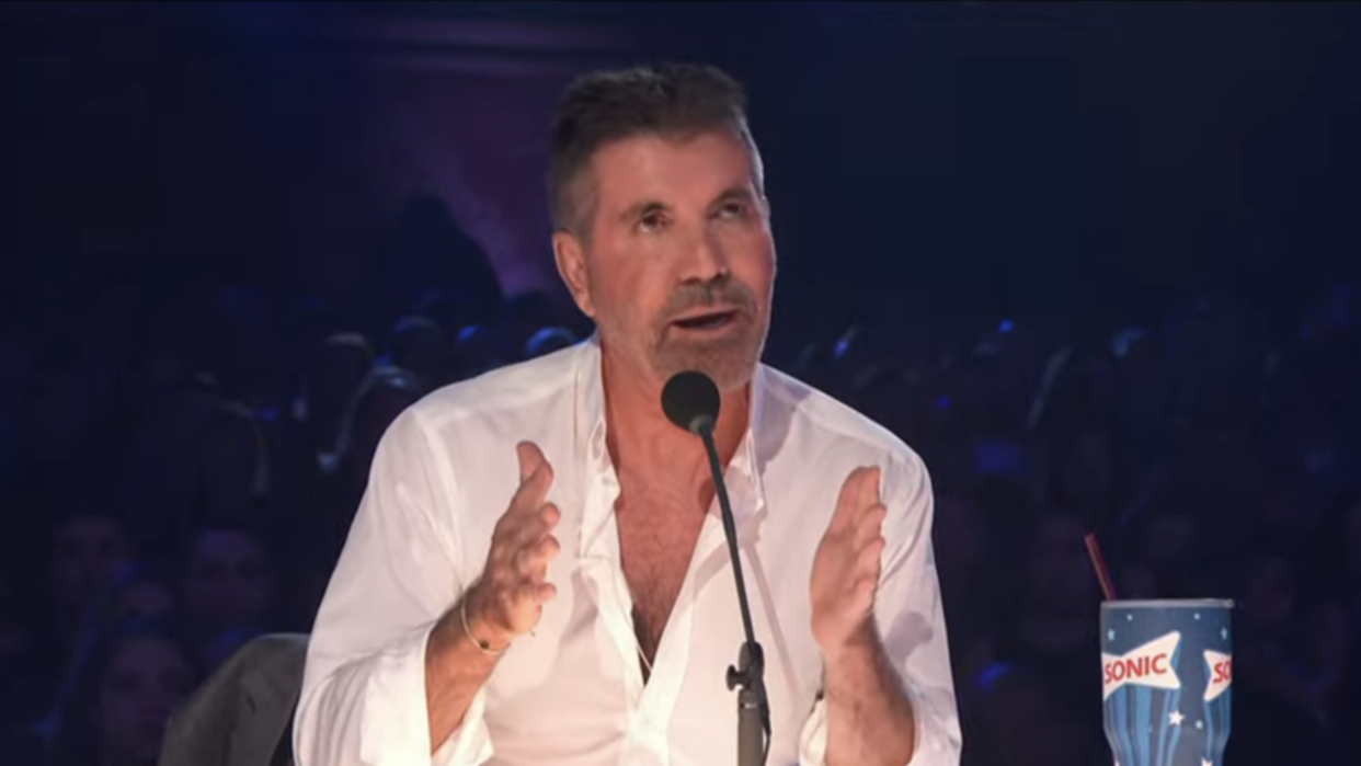  Simon Cowell talking to Putri Ariani in America's Got Talent Season 18 