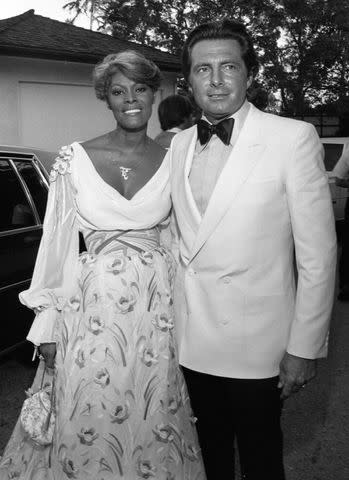 <p>Ralph Dominguez/MediaPunch/Alamy</p> Dionne Warwick and Gianni Russo in 1981