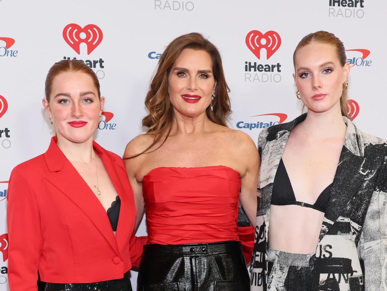 (L-R) Rowan Francis Henchy, Brooke Shields, and Grier Hammond Henchy attend the Z100's iHeartRadio Jingle Ball 2022 Press Room at Madison Square Garden on December 09, 2022 in New York City.