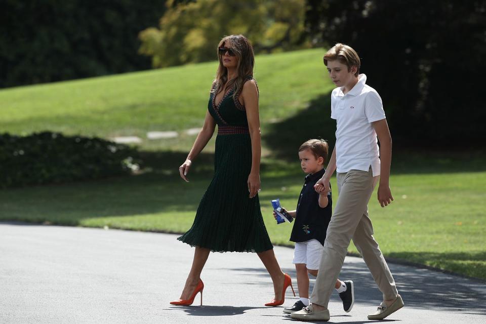 <p>The First Lady took the runway to real life in a simple A-Line dress with a colorful pump walking to a helicopter to department for Camp David in August 2017. </p>