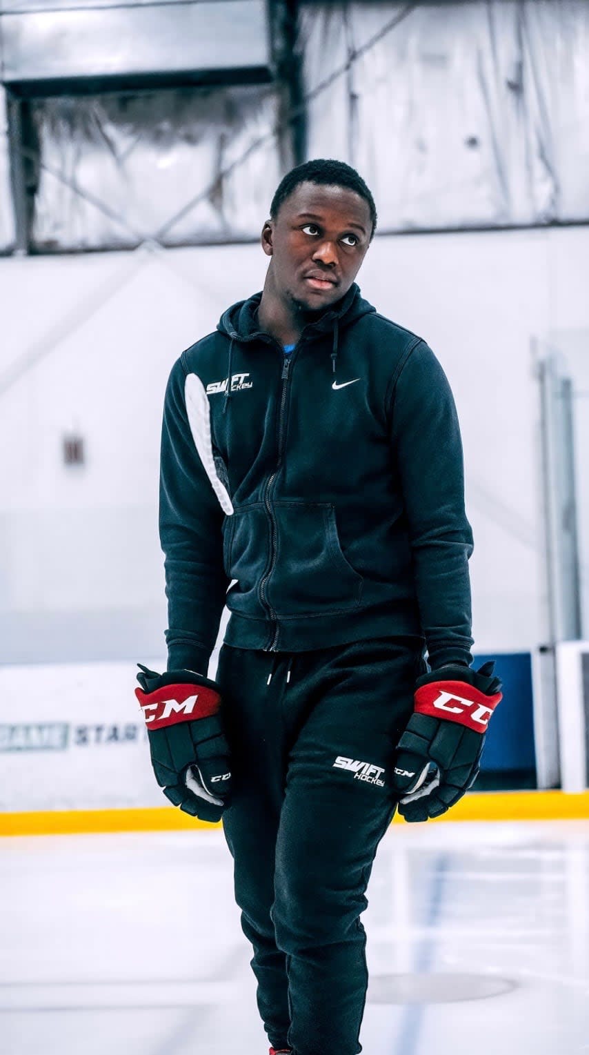 Swift Hockey's owner Zechariah Thomas skates at a company promotional event.  (Swift Hockey - image credit)