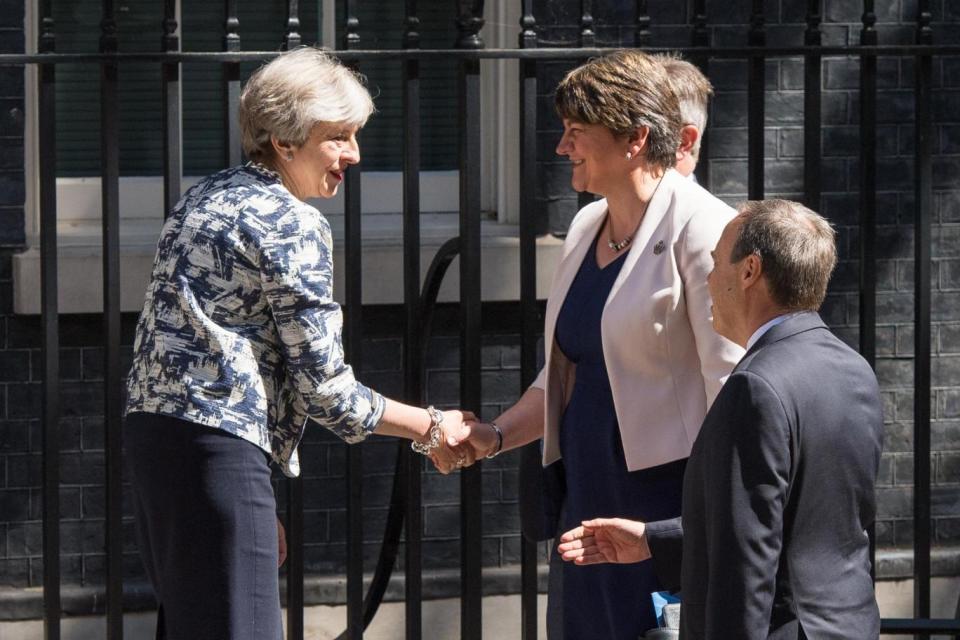 Smiles: Theresa May greets DUP leader Arlene Foster at No 10 in June last year(PA)