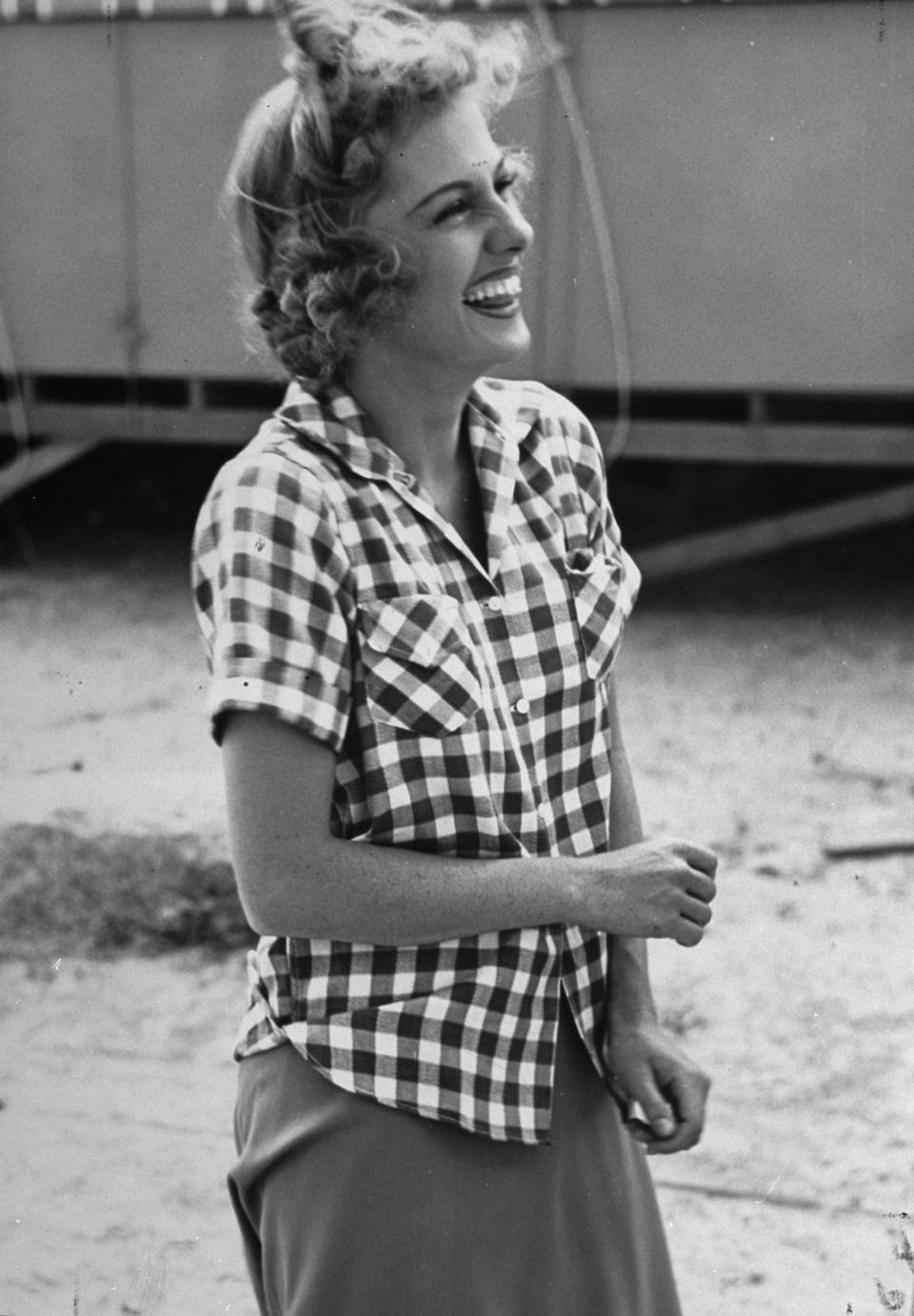 An undated photo of Fontaine laughing while wearing a gingham shirt.