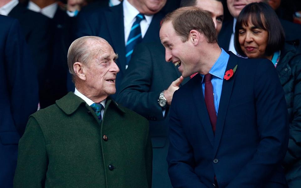 Prince Phillip and Prince William enjoy the build up to the 2015 Rugby World Cup Final match between New Zealand and Australia - Phil Walter/Getty Images Europe 