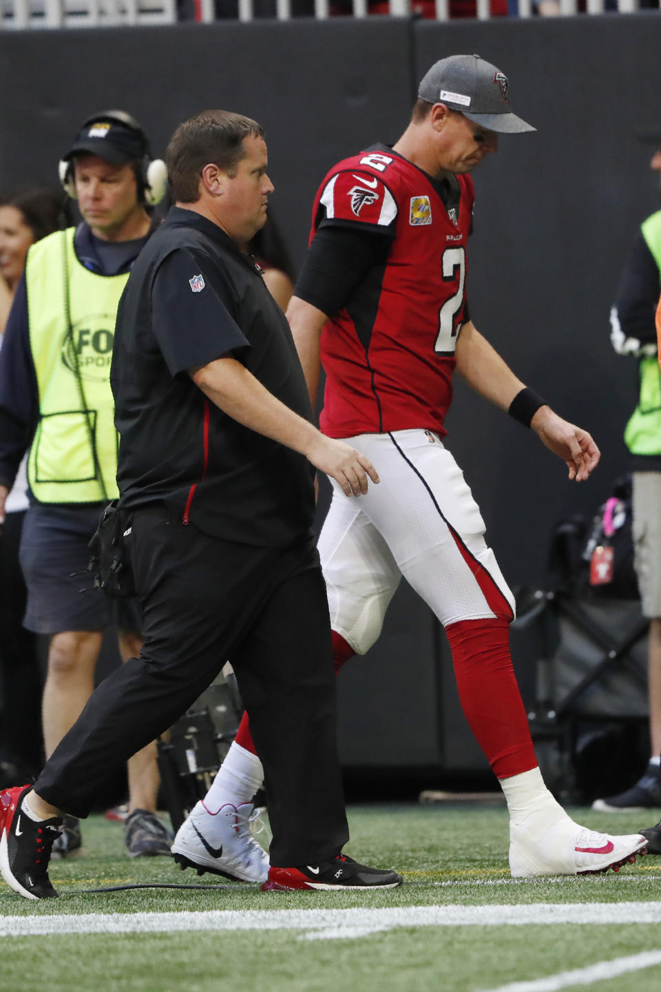 Atlanta Falcons quarterback Matt Ryan (2) leaves the field after injury against the Los Angeles Rams during the second half of an NFL football game, Sunday, Oct. 20, 2019, in Atlanta. (AP Photo/John Bazemore)