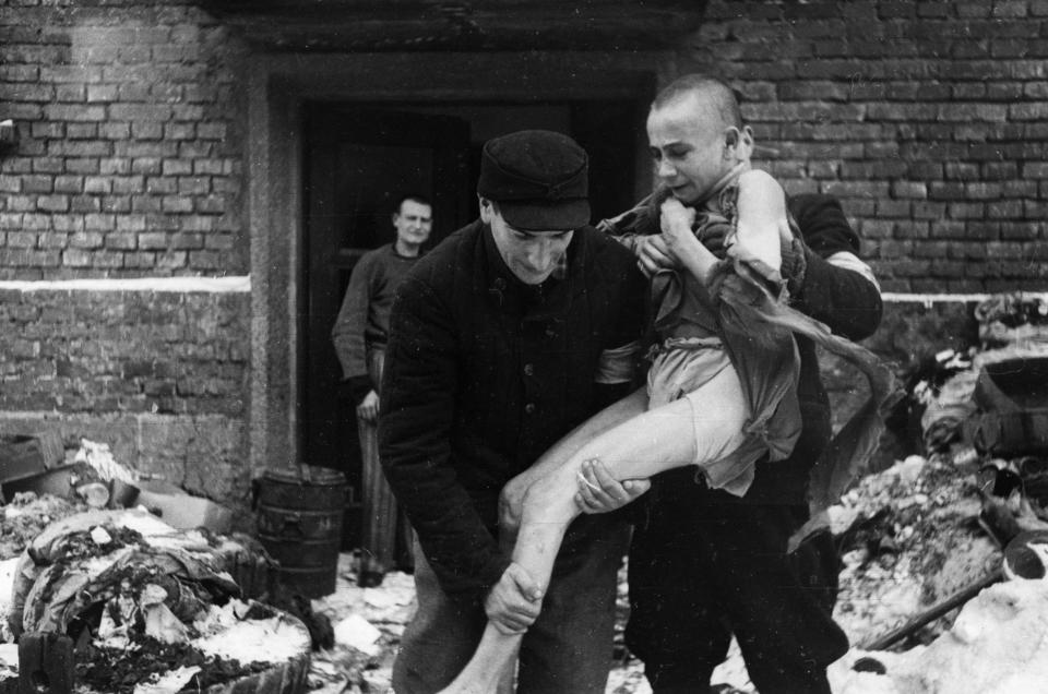 15 year old boy being rescued at Auschwitz