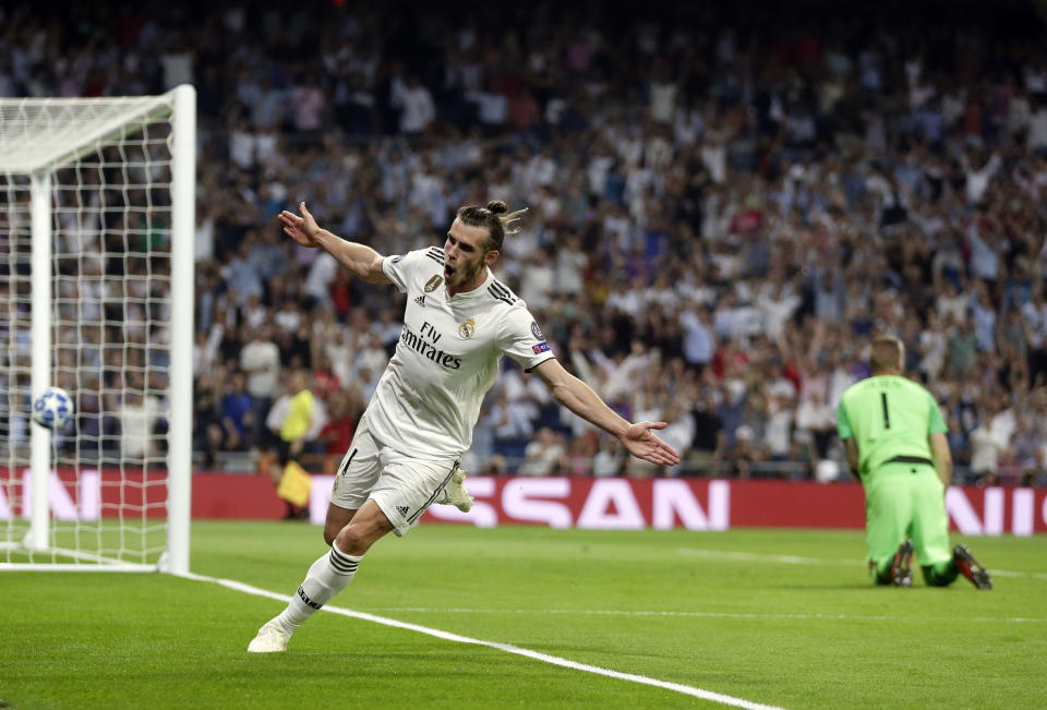 Real midfielder Gareth Bale celebrates after scoring his side's second goal during a Group G Champions League soccer match between Real Madrid and Roma at the Santiago Bernabeu stadium in Madrid, Spain, Wednesday Sept. 19, 2018. (AP Photo/Manu Fernandez)