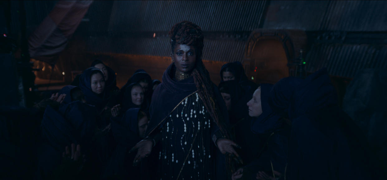 (Center): Mother AniseyaÂ (Jodie Turner-Smith) in Lucasfilm's THE ACOLYTE, exclusively on Disney+. Â©2024 Lucasfilm Ltd. & TM. All Rights Reserved.