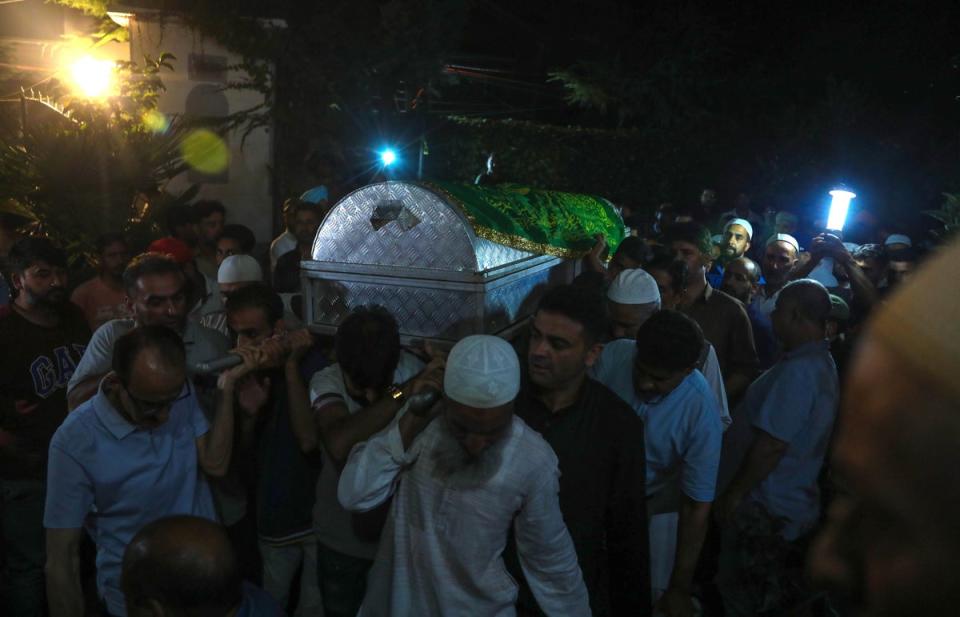 People carry the coffin containing the body of slain Deputy Superintendent (DSP) of Police Humayun Bhat (EPA)