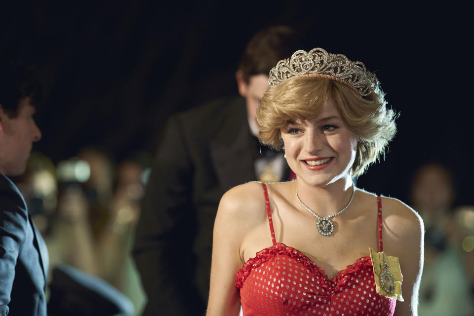 Emma Corrin wearing a pink dress and tiara as Diana Princess of Wales while filming The Crown season four on location in Malaga, Spain