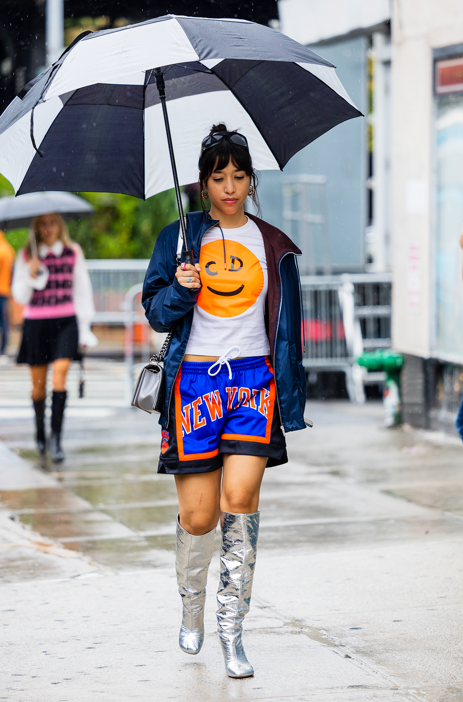 <p>It’s definitely not for the faint of heart, but don’t let this street-style trend intimidate you. Chrome boots are surprisingly easy to style—a simple LBD will do (although if you want this exact <a href="https://go.redirectingat.com?id=74968X1596630&url=https%3A%2F%2Fwww.ebay.com%2Fitm%2F165165470665&sref=https%3A%2F%2Fwww.cosmopolitan.com%2Fstyle-beauty%2Ffashion%2Fg41196528%2Fnew-york-fashion-week-street-style-spring-2023%2F" rel="nofollow noopener" target="_blank" data-ylk="slk:Christian Dior T-shirt;elm:context_link;itc:0;sec:content-canvas" class="link ">Christian Dior T-shirt</a>, it’s on eBay right now!)—plus, they’re a total conversation starter.</p><p><em>Zara Laminated Heeled Boots, $119</em></p><p> <a class="link " href="https://go.redirectingat.com?id=74968X1596630&url=https%3A%2F%2Fwww.zara.com%2Fus%2Fen%2Flaminated-heeled-boots-p13004010.html%3Fv1%3D180446852&sref=https%3A%2F%2Fwww.cosmopolitan.com%2Fstyle-beauty%2Ffashion%2Fg41196528%2Fnew-york-fashion-week-street-style-spring-2023%2F" rel="nofollow noopener" target="_blank" data-ylk="slk:SHOP NOW;elm:context_link;itc:0;sec:content-canvas">SHOP NOW</a></p><p><em>Ganni Basic Cotton Jersey T-Shirt, $95</em></p><p><a class="link " href="https://go.redirectingat.com?id=74968X1596630&url=https%3A%2F%2Fwww.ganni.com%2Fus%2Fbasic-cotton-jersey-t-shirt-smiley-yellow-bright-white-T273115104.html&sref=https%3A%2F%2Fwww.cosmopolitan.com%2Fstyle-beauty%2Ffashion%2Fg41196528%2Fnew-york-fashion-week-street-style-spring-2023%2F" rel="nofollow noopener" target="_blank" data-ylk="slk:SHOP NOW;elm:context_link;itc:0;sec:content-canvas">SHOP NOW</a></p>