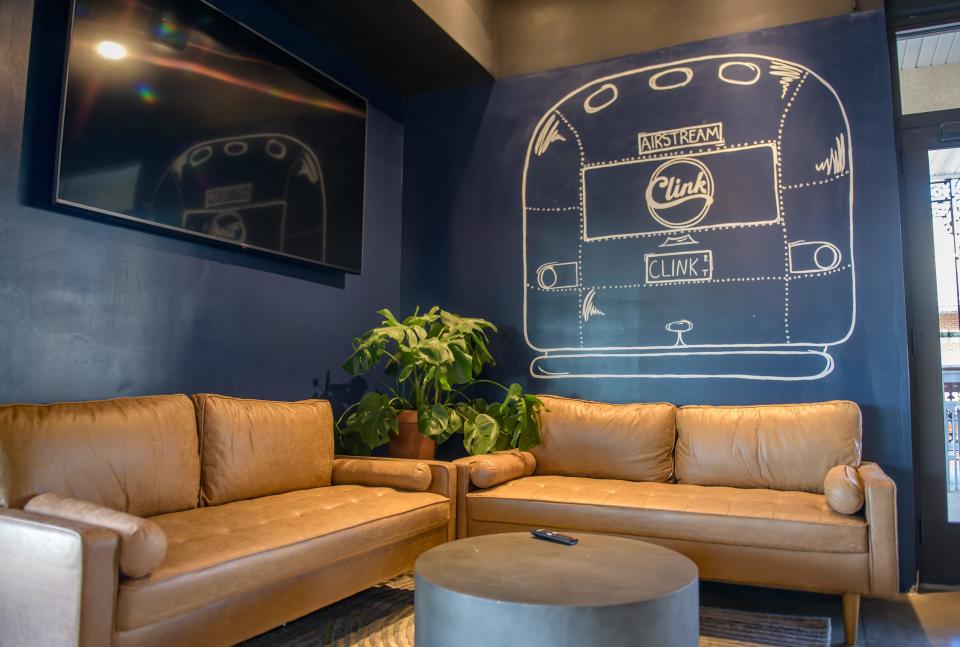The new Peoria Heights tavern Clink Bar and Events is an offshoot from the owners of of the Clink Mobile Bar, a 1965 Airstream trailer converted into a bar on wheels. Artwork on wall of Clink pays homage to the trailer.