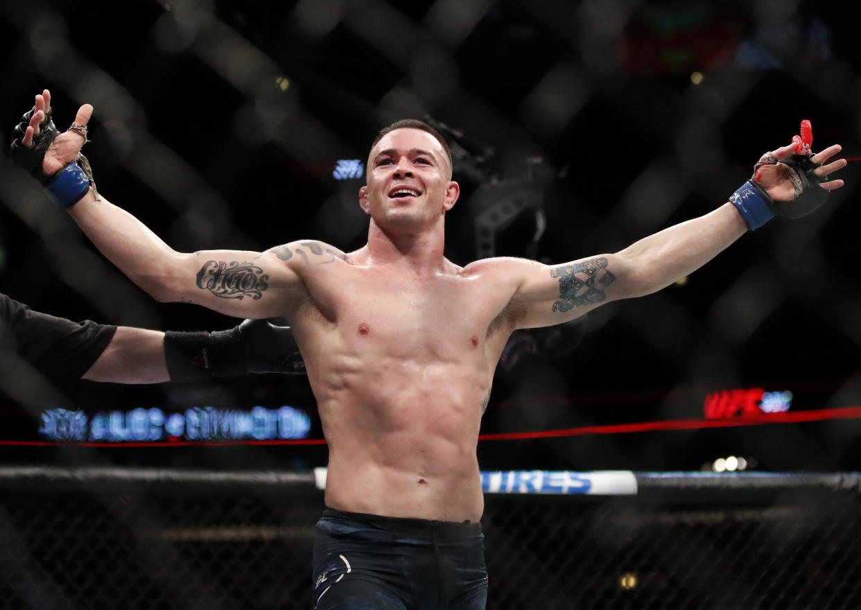 Colby Covington reacts after his win against Rafael Dos Anjos during their interim welterweight UFC 225 bout in Chicago. (AP Photo/Jim Young)