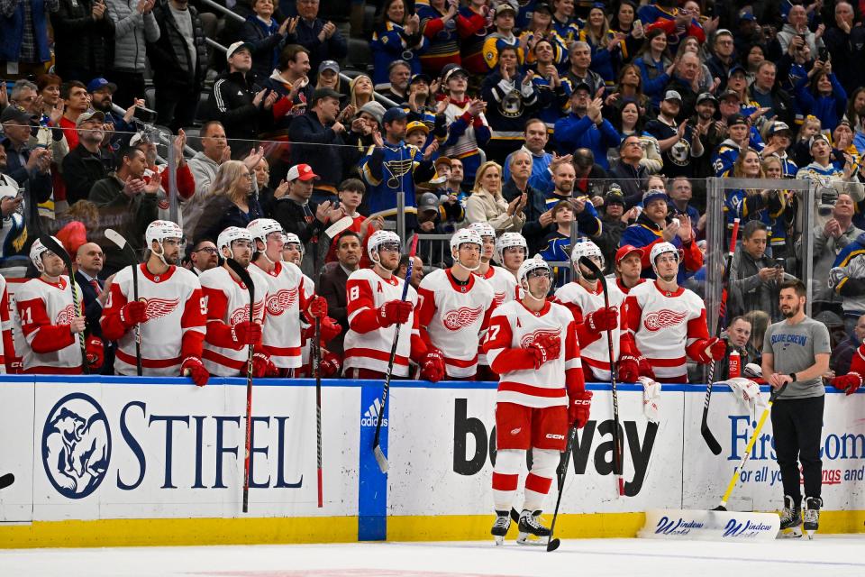 Detroit Red Wings left wing David Perron (57) reacts as he receives a standing ovation for his time in St. Louis from the St. Louis Blues fans during the first period at Enterprise Center in St. Louis on Tuesday, March 21, 2023.