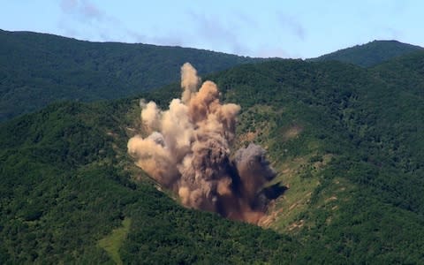 In this handout image provide by South Korean Defense Ministry, A bomb hits a mock target at the Pilseung Firing Range - Credit: South Korean Defense Ministry via Getty Images
