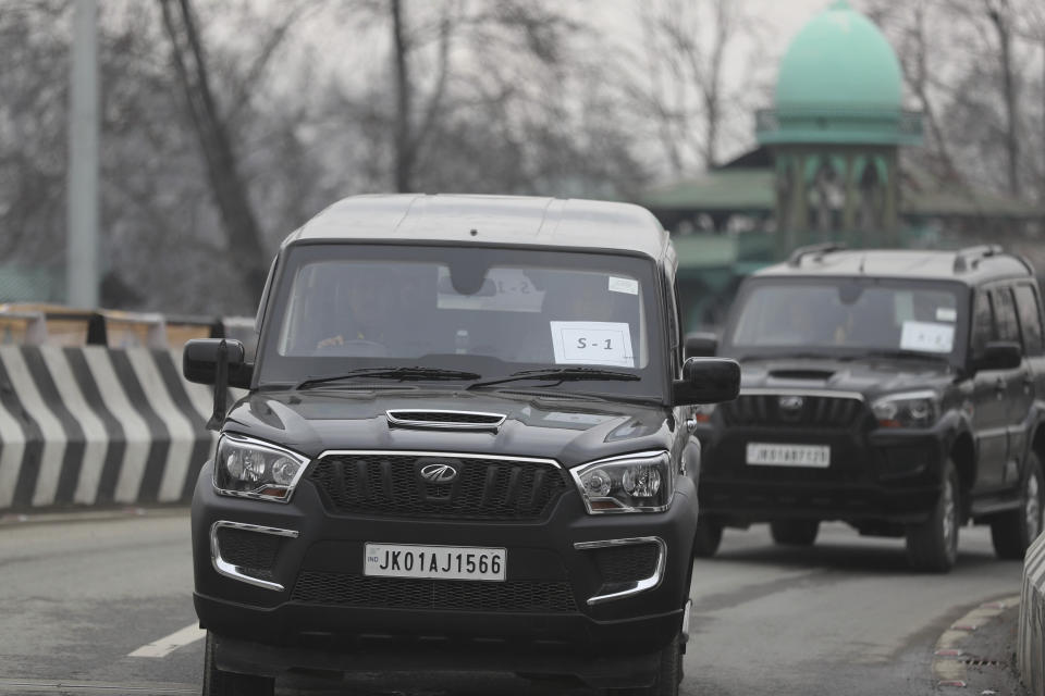 A convoy of New Delhi-based diplomats passes through Srinagar, Indian controlled Kashmir, Thursday, Jan. 9, 2020. Envoys from 15 countries including the United States are visiting Indian-controlled Kashmir starting Thursday for two days, the first by New Delhi-based diplomats since India stripped the region of its semi-autonomous status and imposed a harsh crackdown in early August. (AP Photo/Mukhtar Khan)