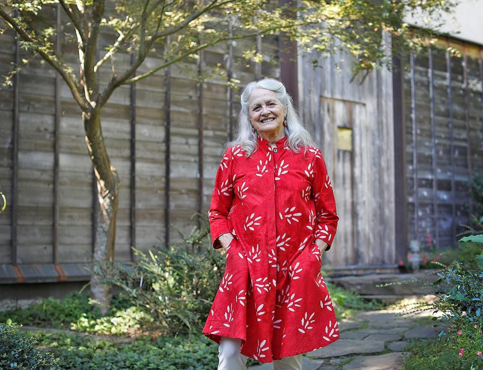 Barbara " Babs" Wolinsky outside the Trillium Studio, next to the Norwell home she shared with Cary Wolinsky for some 50 years.
