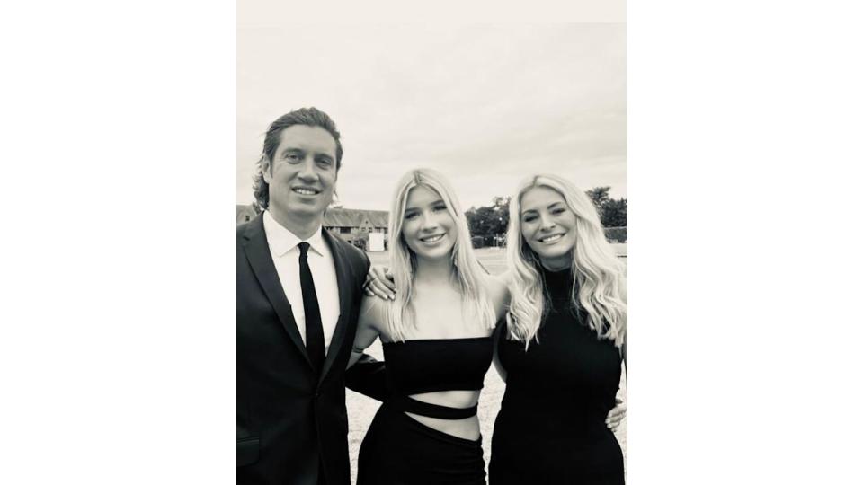 Tess Daly and Vernon Kay in black and white picture with daughter