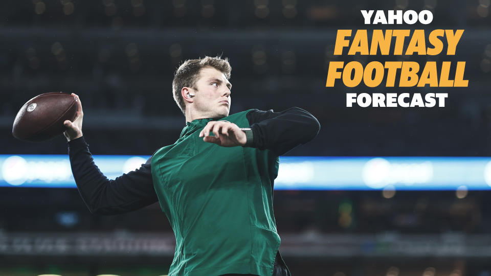 New York Jets QB Zach Wilson warms up prior to a game in 2022. The Jets are likely to roster Wilson in 2023 but will most likely be seeking a veteran to upgrade the position and are linked most closely to Green Bay's Aaron Rodgers (Photo by Michael Owens/Getty Images)