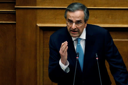 Former Greek Prime Minister Antonis Samaras addresses lawmakers during a parliamentary session before a vote on setting up a special committee which will probe the role of ten politicians in a case which involves alleged bribery by Swiss drugmaker Novartis, in Athens, Greece, February 21, 2018. REUTERS/Alkis Konstantinidis