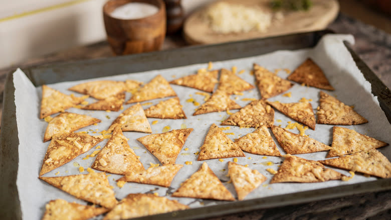 Tortilla chips on baking sheet