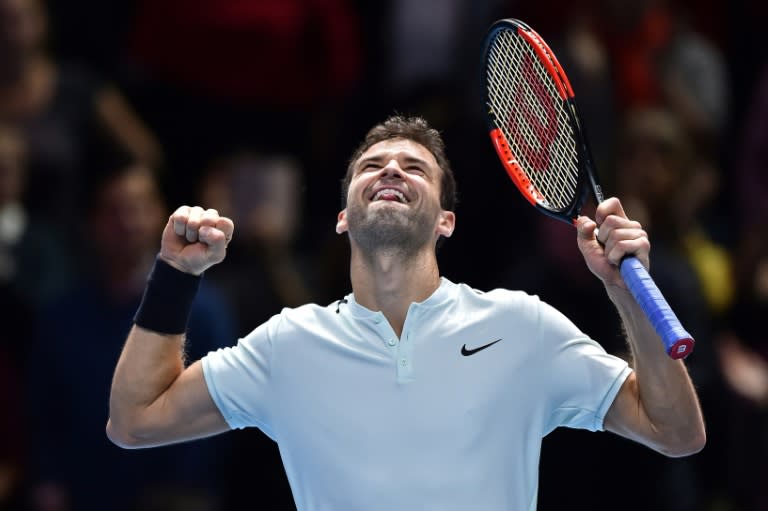 Bulgaria's Grigor Dimitrov celebrates his three set victory over Austria's Dominic Thiem during the ATP World Tour Finals tennis tournament in London on November 13, 2017