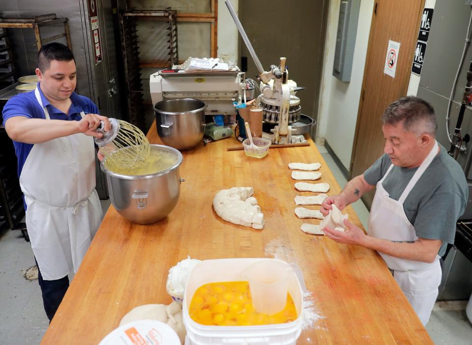 Ivan Rosas, left, and his uncle Jose Melgoza prepare pastries at Trigales Bakery in Appleton. Rosas learned the bakery trade in Mexico from his uncles, including Melgoza, before eventually moving to the Fox Cities and buying Trigales.