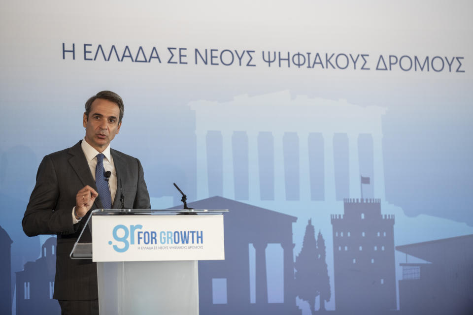 Greek Prime Minister Kyriakos Mitsotakis speaks during a ceremony of Microsoft held in the Acropolis Museum, central Athens, on Monday, Oct. 5, 2020. Microsoft has announced plans to build three data centers in greater Athens, providing a badly needed investment of up to $1 billion to the Greek economy which has been hammered by the pandemic. (AP Photo/Petros Giannakouris)