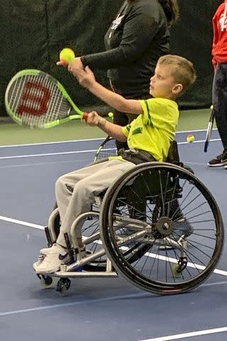 <p>Courtesy Keely Roberts</p> Cooper Roberts in adaptive tennis