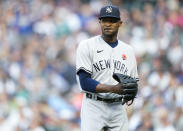 New York Yankees starting pitcher Domingo German walks off the field after throwing against the Seattle Mariners during the second inning of a baseball game Monday, May 29, 2023, in Seattle. (AP Photo/Lindsey Wasson)