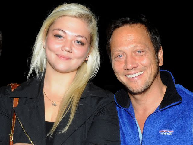 <p>Michael Schwartz/WireImage</p> Elle King and Rob Schneider pose at The Ice House Comedy Club on October 22, 2009 in Pasadena, California.