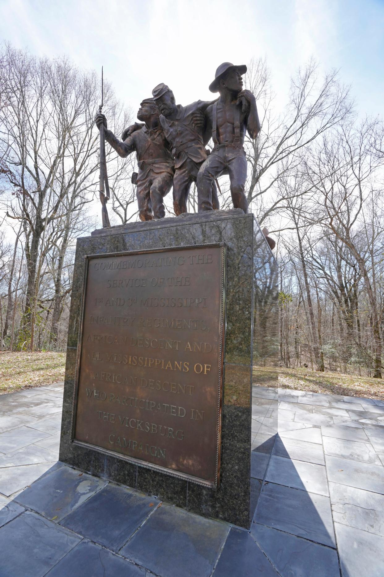 The Mississippi African-American Monument, a 9-foot tall, bronze sculpture that rests on a pedestal of African black granite, and features two Black Union soldiers, and a common field hand, as photographed, Feb. 14, 2024, in the Vicksburg National Military Park, in Vicksburg, Miss. The sculpture honors the service of the 1st and 3rd Mississippi Infantry Regiments (African descent) and all Mississippians of African descent who participated in the Vicksburg Campaign.