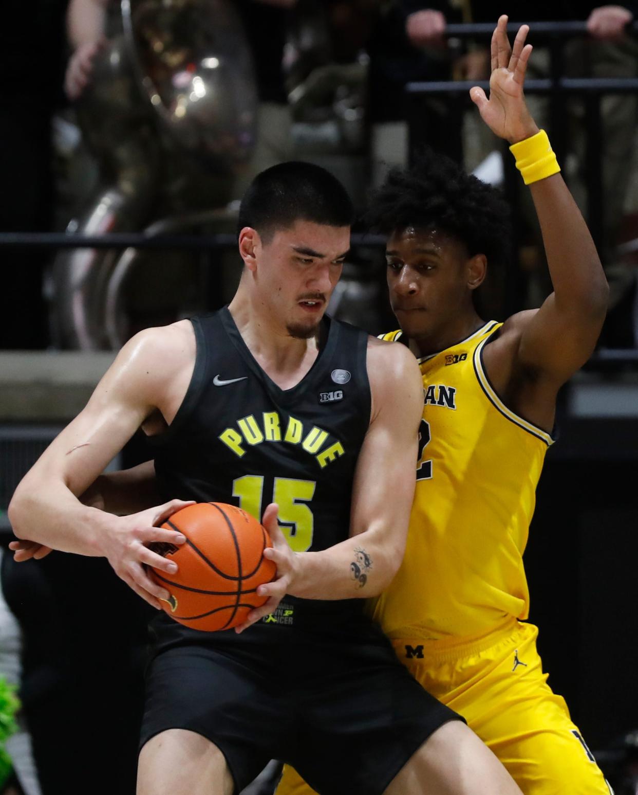 Purdue Boilermakers center Zach Edey (15) is guarded by Michigan Wolverines forward Tarris Reed Jr. (32) at Mackey Arena in West Lafayette, Indiana, on Tuesday, Jan. 23, 2024.