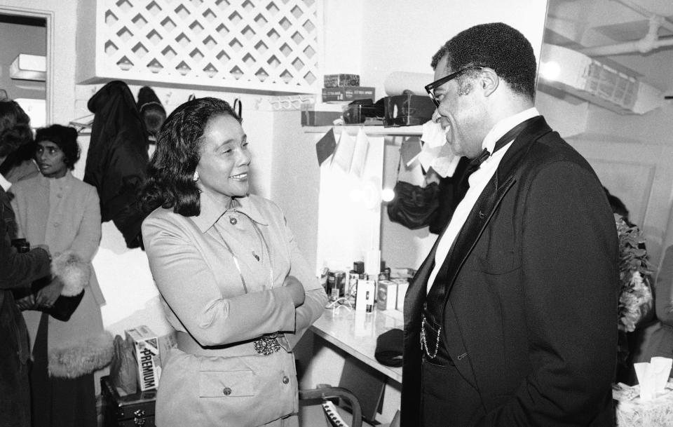 1977: Coretta Scott King, widow of slain civil rights leader Dr. Martin Luther King, chats with actor James Earl Jones backstage at the National Theater in Washington on Wednesday, Dec. 22, 1977. Jones is starring at the theater as Paul Robeson.
