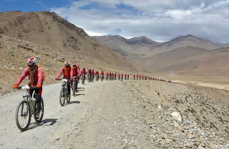 Buddhist nuns from the Drukpa lineage pictured in Ladakh during their cycle across the Himalayas to raise awareness about human trafficking of girls and women in the impoverished villages in Nepal and India August 30, 2016. REUTERS/Live To Love International/Handout via REUTERS