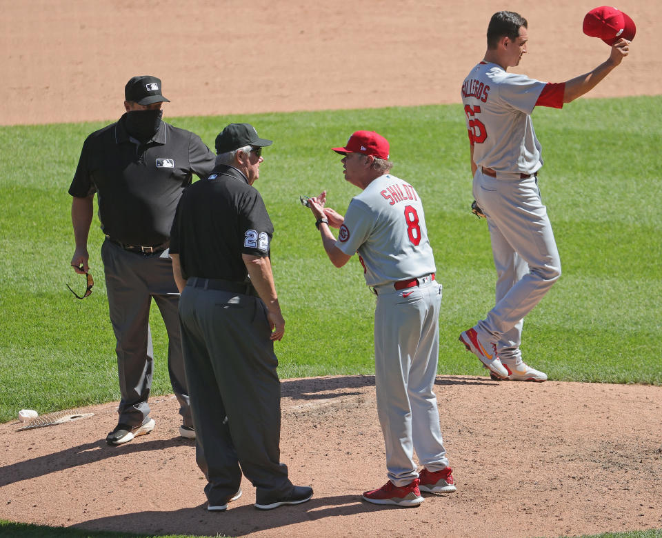 CHICAGO, ILLINOIS - MAY 26: Manager Mike Shildt #8 of the St. Louis Cardinals argues with umpire Joe West #22 after being ejected from the game in the 7th inning against the Chicago White Sox at Guaranteed Rate Field on May 26, 2021 in Chicago, Illinois. The Cardinals defeated the White Sox 4-0. (Photo by Jonathan Daniel/Getty Images)