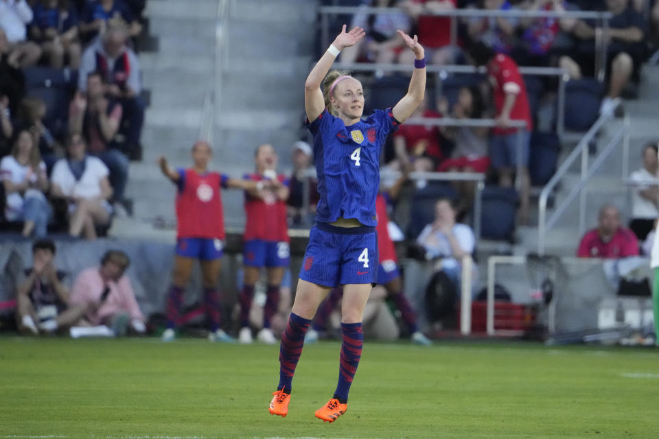 USA' Becky Sauerbrunn waves as she departs during the first half of an international friendly soccer match against Ireland Tuesday, April 11, 2023 in St. Louis.  (AP Photo/Jeff Roberson)